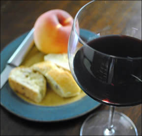Red wine with biscotti and fruit